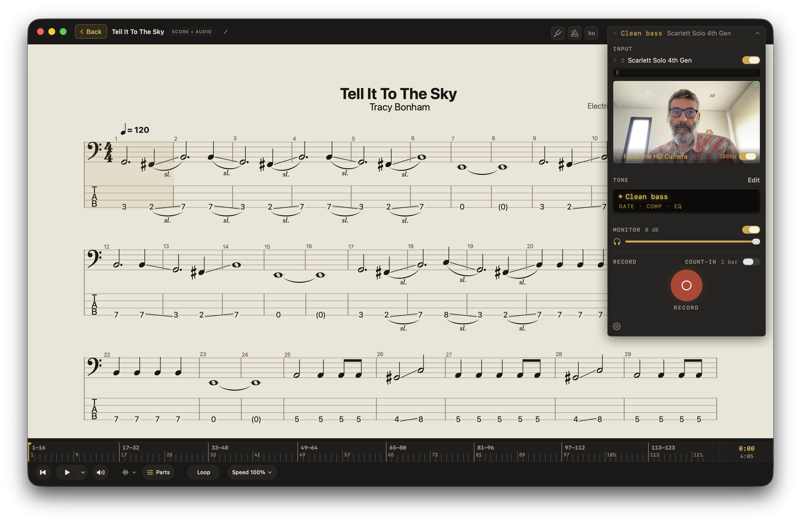 A score in Afinar with instrument tone controls and a woman playing bass in the camera view.